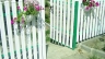 Landscape design. Options for decorative fences on the backyard
