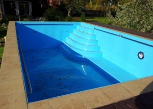 Plastic pools of polypropylene: the choice of a place, the preparation of a trench, the installation of a bowl, the installation of a bowl of propylene, the pouring of concrete by the side walls, the care of the pool.