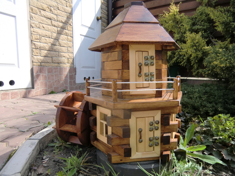 Декоративная мельница для сада как элемент ландшафтного дизайна